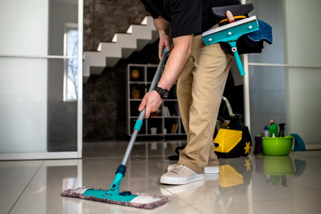 Bangkok Cleaning Service staff sanitizing a commercial restroom
