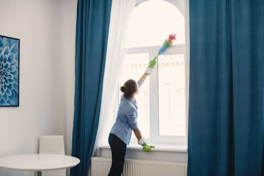 Professional curtain cleaning service in Silom Bangkok removing dust from apartment curtains